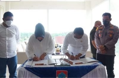 Dua Kepala Daerah Boltim dan Kota Kotamobagu Lakukan Penandatanganan MoU