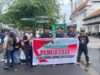 Front Jihad Islam Yogyakarta Bentangkan Spanduk dan Bagi Selebaran: ‘Turut Andil Ciptakan Pemilu yang Aman dan Damai’